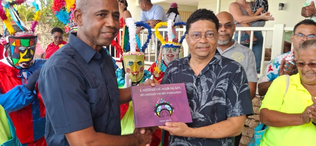 BUKI NOBO PA MUCHA ‘E MISTERIO DI MASKARADA’ TA KONTRIBUÍ NA PRESERVASHON DI TRADISHON KULTURAL DI BONEIRU